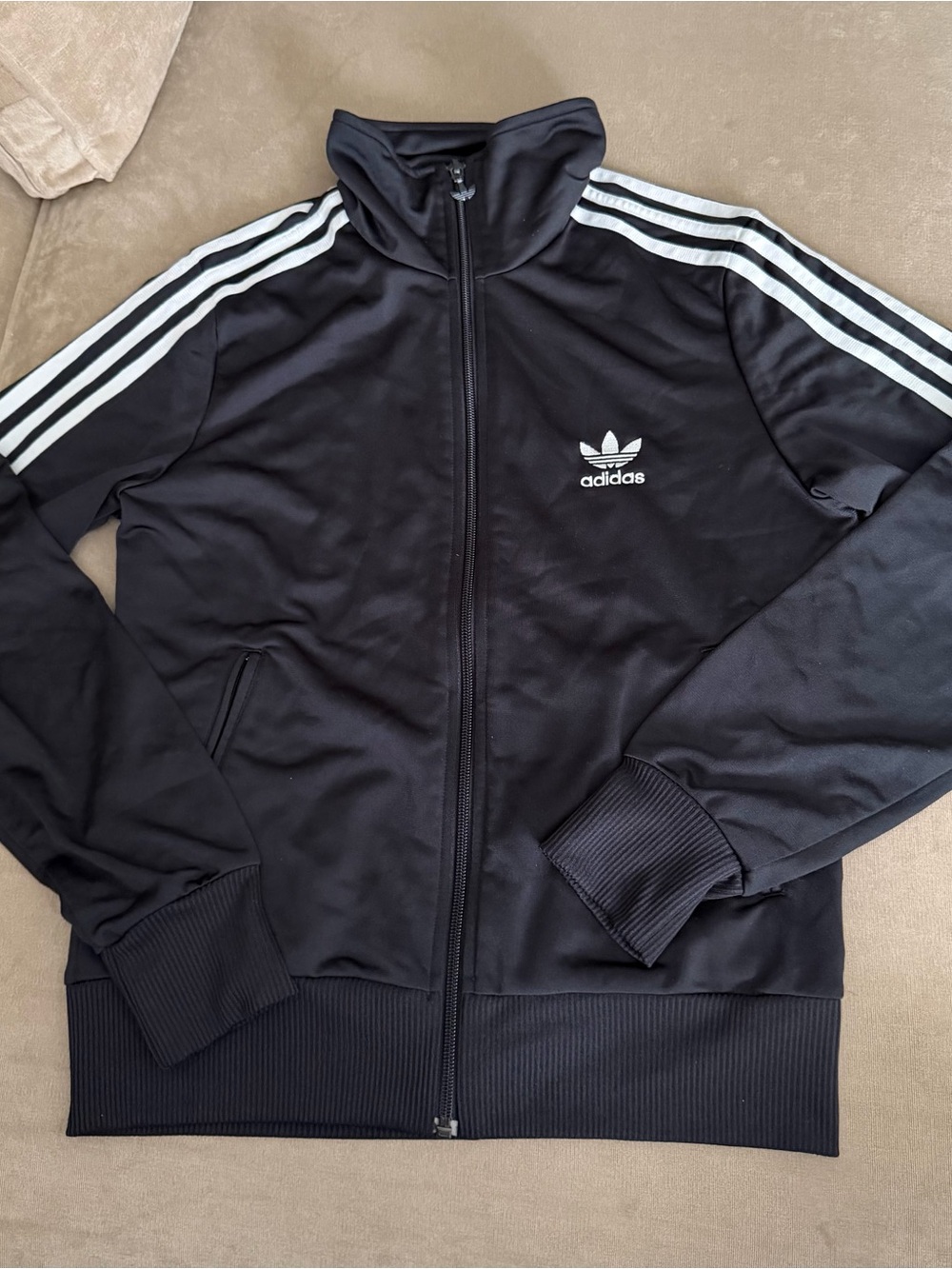 Adidas Black Track Jacket with White Three Stripes, chest and back logos.